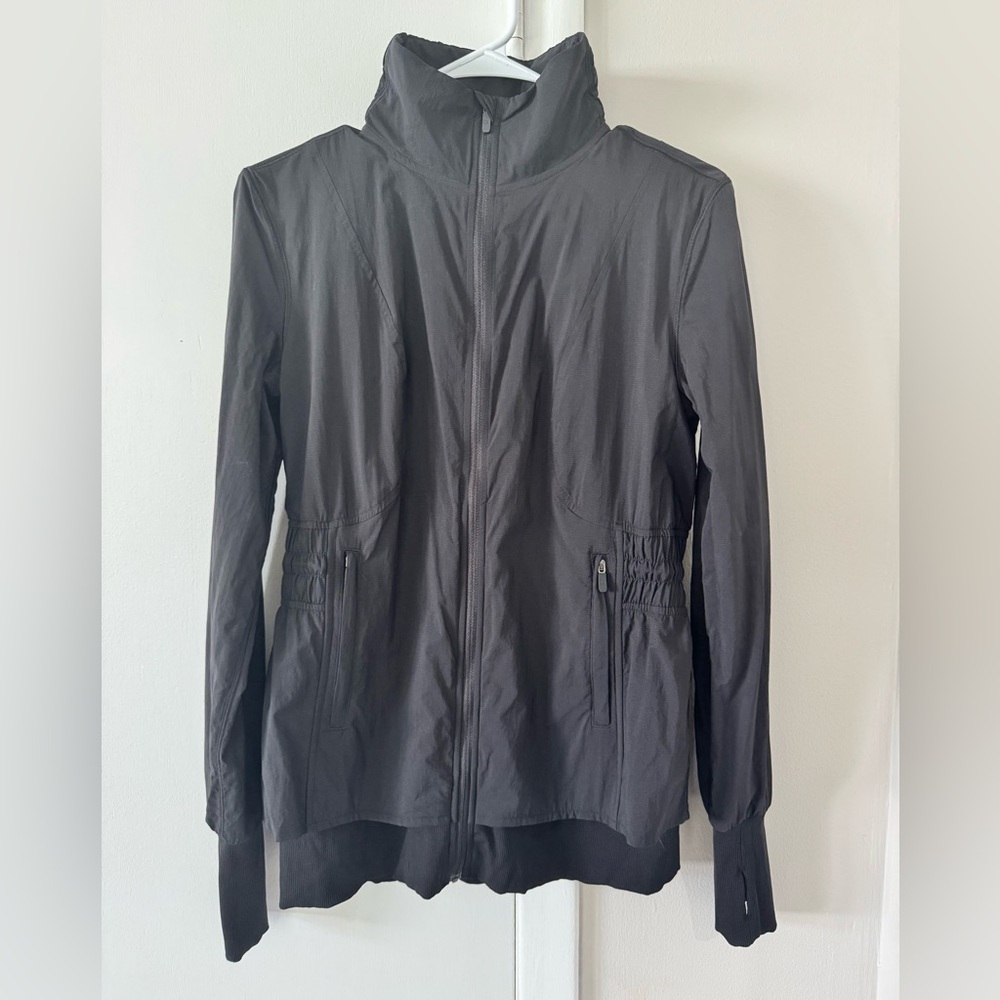 Lululemon Woman’s Black Utility Jacket with Stand-Up Collar and Peplum Ruffle